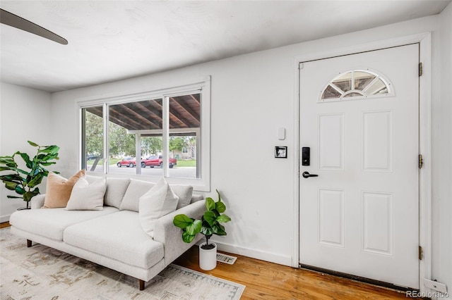 7350 Dale Ct, Westminster, CO 80030 - entrance foyer with wood finished floors and baseboards