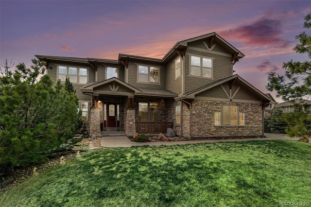 12161 S Leaning Pine Ct, Parker, CO 80134 - craftsman-style house with a yard and stone siding
