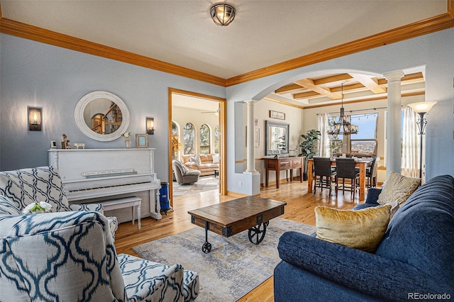 12161 S Leaning Pine Ct, Parker, CO 80134 - living area featuring decorative columns, crown molding, arched walkways, coffered ceiling, and a wealth of natural light