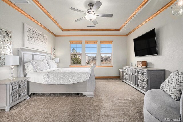 12161 S Leaning Pine Ct, Parker, CO 80134 - carpeted bedroom with ceiling fan, visible vents, a raised ceiling, baseboards, and ornamental molding