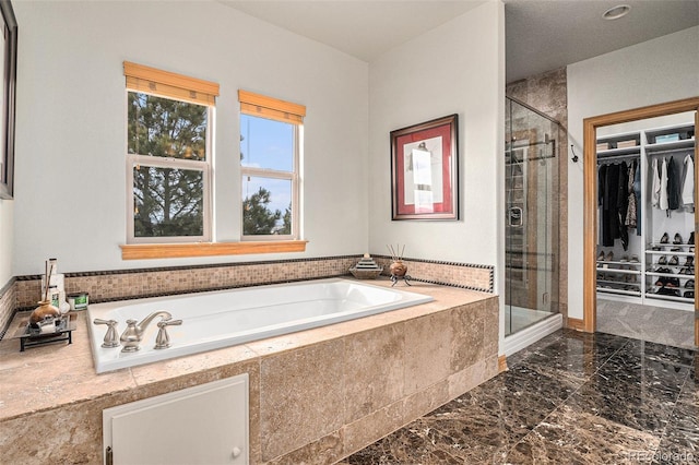 12161 S Leaning Pine Ct, Parker, CO 80134 - full bath with a walk in closet, a shower stall, a bath, and marble finish floor
