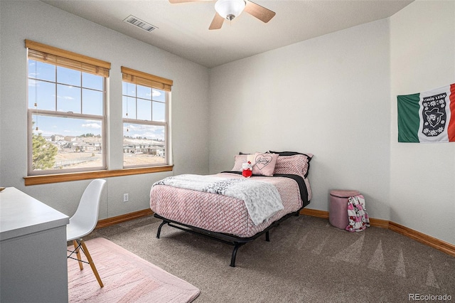 12161 S Leaning Pine Ct, Parker, CO 80134 - bedroom with carpet flooring, baseboards, visible vents, and ceiling fan