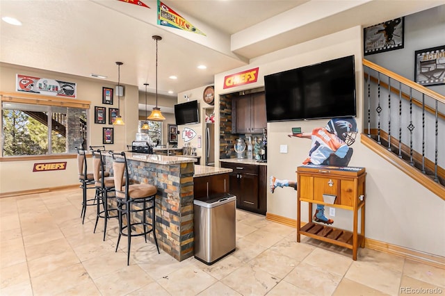 12161 S Leaning Pine Ct, Parker, CO 80134 - bar with hanging light fixtures, stairway, baseboards, indoor wet bar, and recessed lighting