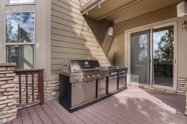 12161 S Leaning Pine Ct, Parker, CO 80134 - deck featuring a grill and area for grilling