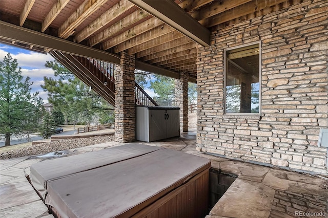 12161 S Leaning Pine Ct, Parker, CO 80134 - view of patio with stairway and a covered hot tub