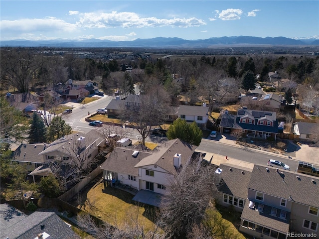 bird's eye view featuring a residential view and a mountain view