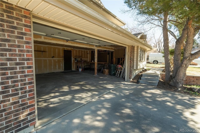 garage featuring driveway
