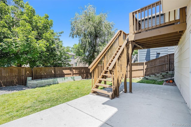 9651 Lameria Dr, Highlands Ranch, CO 80130 - fenced backyard with a patio, stairs, and a deck