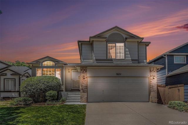 9651 Lameria Dr, Highlands Ranch, CO 80130 - traditional-style house with an attached garage and driveway