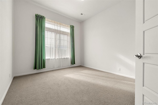 view of carpeted spare room