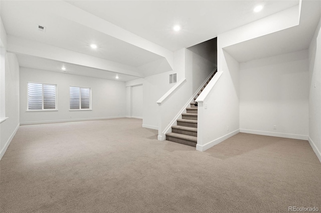 basement with light carpet