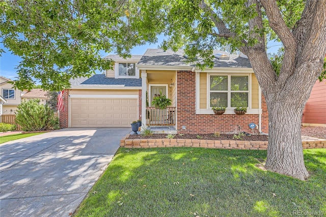 view of front of home with a garage and a front yard