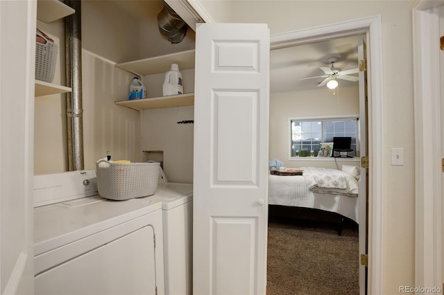 washroom featuring washer and dryer, carpet, ceiling fan, and laundry area