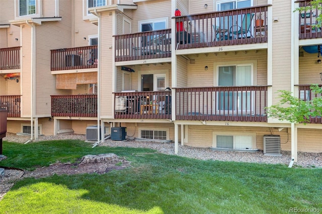 view of building exterior featuring central AC unit