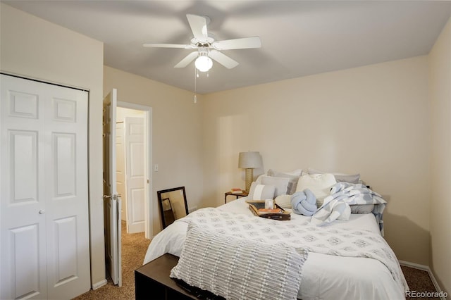 carpeted bedroom with ceiling fan