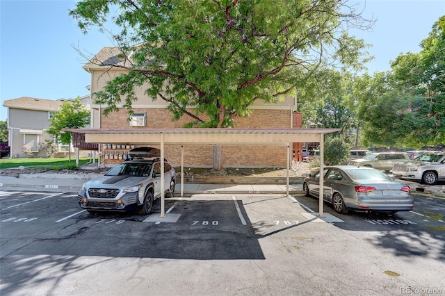 view of front of property featuring a carport