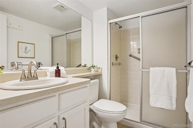 8335 Fairmount Dr Unit 5-106, Denver, CO 80247 - bathroom with a shower stall, toilet, and vanity