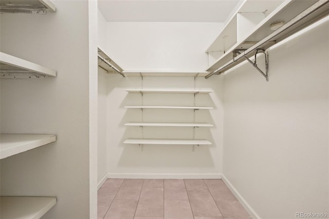 8335 Fairmount Dr Unit 5-106, Denver, CO 80247 - spacious closet with light tile patterned floors