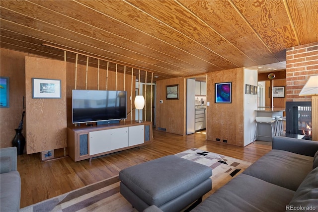 1400 E Bates Ave, Englewood, CO 80113 - living room featuring wood finished floors and wooden ceiling