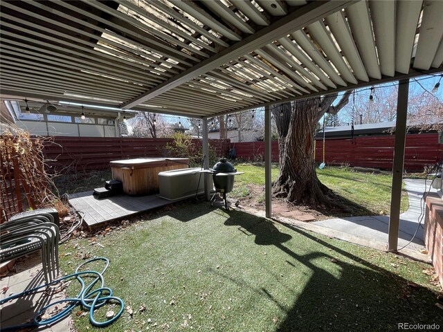 1400 E Bates Ave, Englewood, CO 80113 - view of yard featuring a hot tub and a patio area