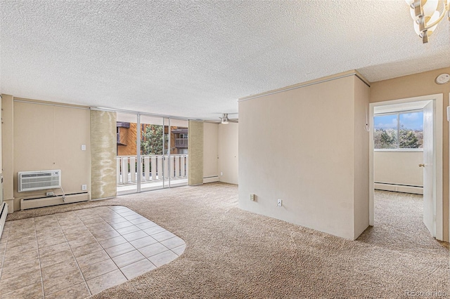 interior space featuring light carpet, ceiling fan, a textured ceiling, and a baseboard radiator