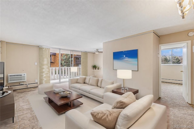 living room featuring a wall unit AC, a baseboard radiator, and a textured ceiling