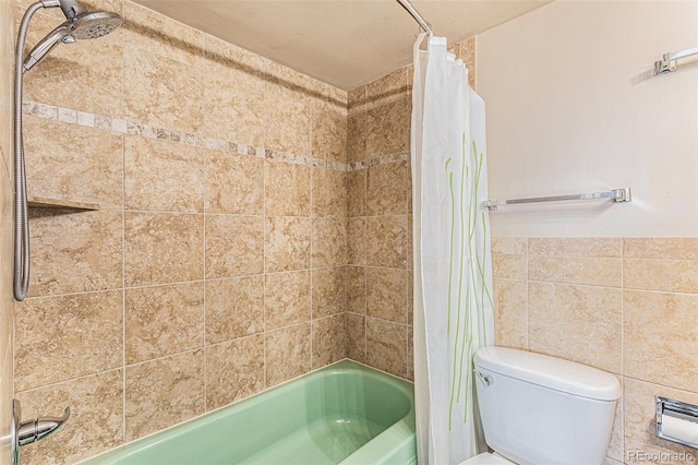 bathroom with toilet and shower / tub combo with curtain