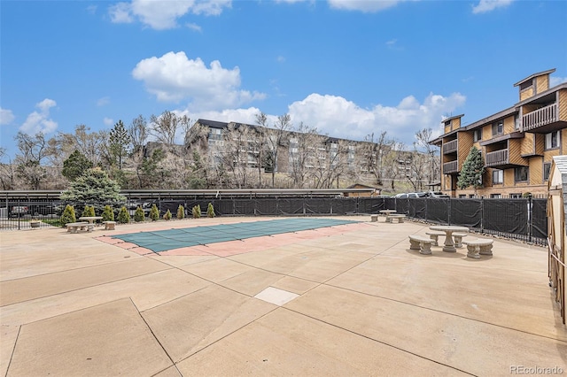 view of pool featuring a patio area