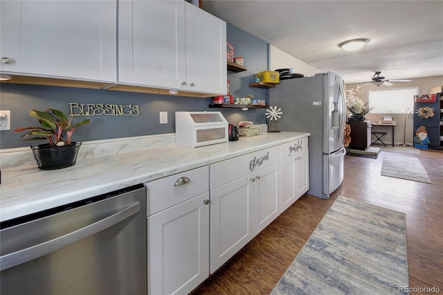 397 Will Scarlet Dr, Divide, CO 80814 - kitchen featuring stainless steel appliances, white cabinetry, dark wood-type flooring, and ceiling fan