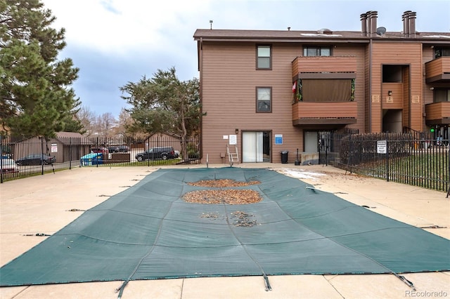 view of swimming pool featuring a patio