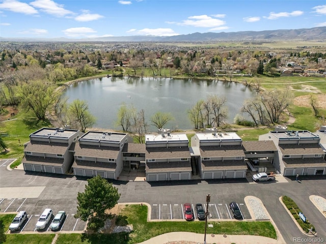 10520 W Jewell Ave Unit 102, Lakewood, CO 80232 - aerial view featuring a water and mountain view