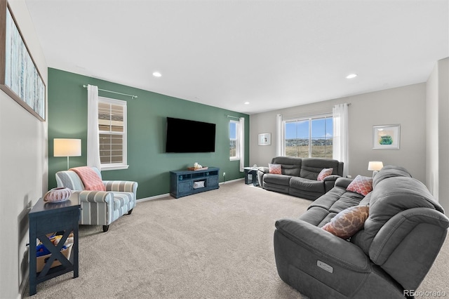 carpeted living room featuring recessed lighting and baseboards