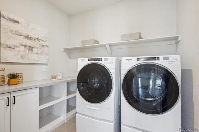 14337 Shasta Daisy Pt, Parker, CO 80134 - laundry room featuring independent washer and dryer, cabinet space, and light tile patterned floors