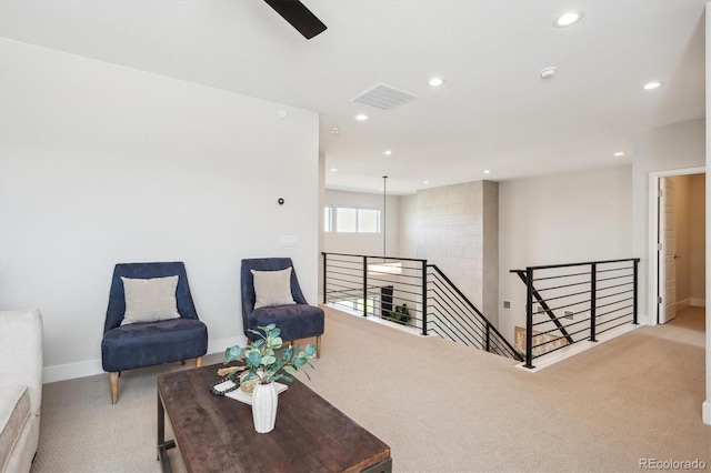 14337 Shasta Daisy Pt, Parker, CO 80134 - living area with an upstairs landing, carpet, recessed lighting, baseboards, and ceiling fan