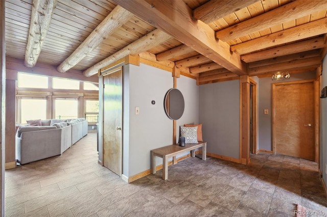 102 Douglas Fir Ln, Woodland Park, CO 80863 - hall with wood ceiling, baseboards, and beamed ceiling
