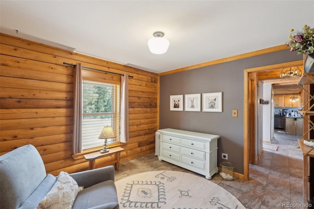 102 Douglas Fir Ln, Woodland Park, CO 80863 - living area with baseboards and rustic walls