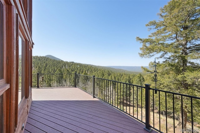 102 Douglas Fir Ln, Woodland Park, CO 80863 - wooden terrace with a forest view