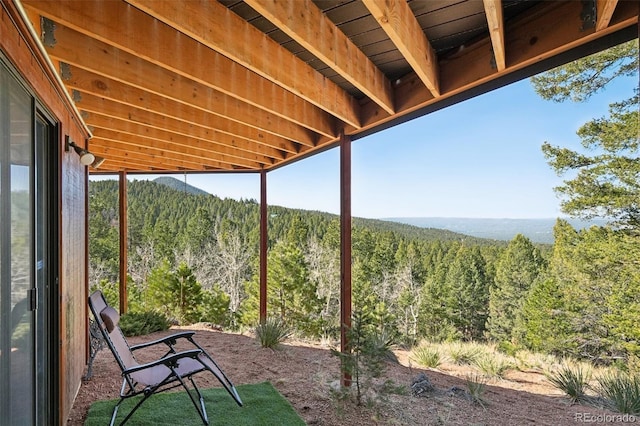102 Douglas Fir Ln, Woodland Park, CO 80863 - view of patio featuring a forest view