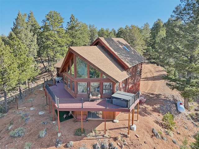 102 Douglas Fir Ln, Woodland Park, CO 80863 - back of property with a wooden deck