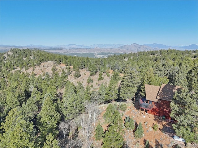 102 Douglas Fir Ln, Woodland Park, CO 80863 - drone / aerial view featuring a mountain view and a view of trees