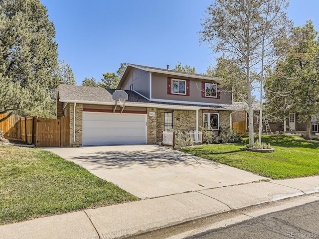 front of property with covered porch, a front yard, and a garage