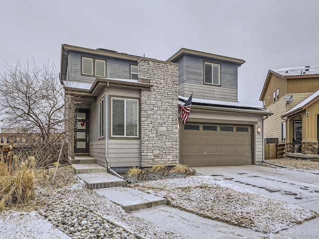 view of front of property with a garage