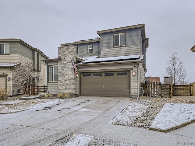 front of property featuring a garage