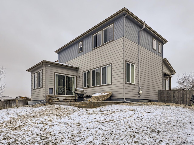 view of snow covered property