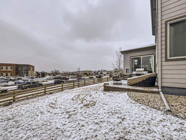 yard covered in snow featuring an outdoor fire pit