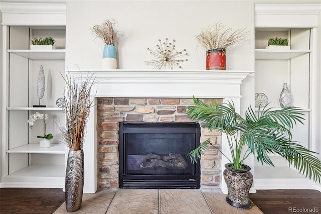 room details with a stone fireplace