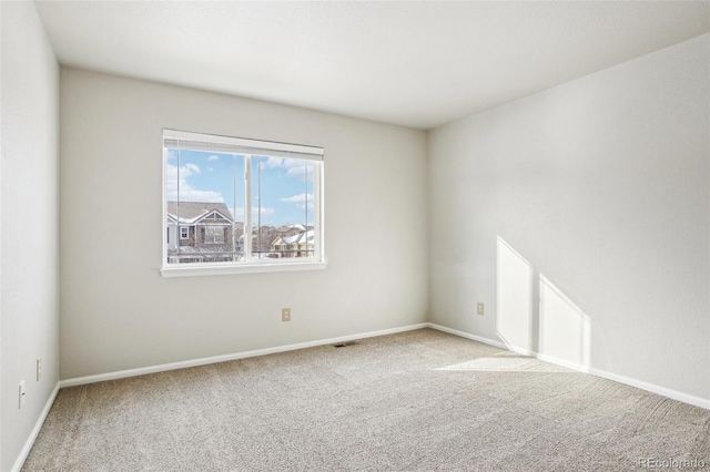 view of carpeted spare room