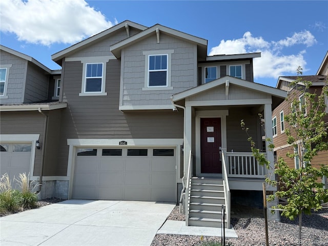 9041 Redfield Ln, Parker, CO 80134 - view of front of house with driveway, a garage, and a porch