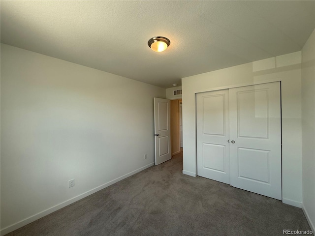 9041 Redfield Ln, Parker, CO 80134 - unfurnished bedroom featuring baseboards, carpet, and a closet