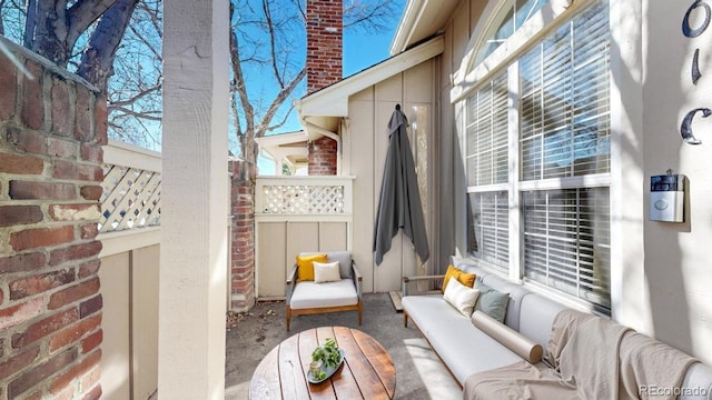 view of patio / terrace featuring fence and an outdoor living space